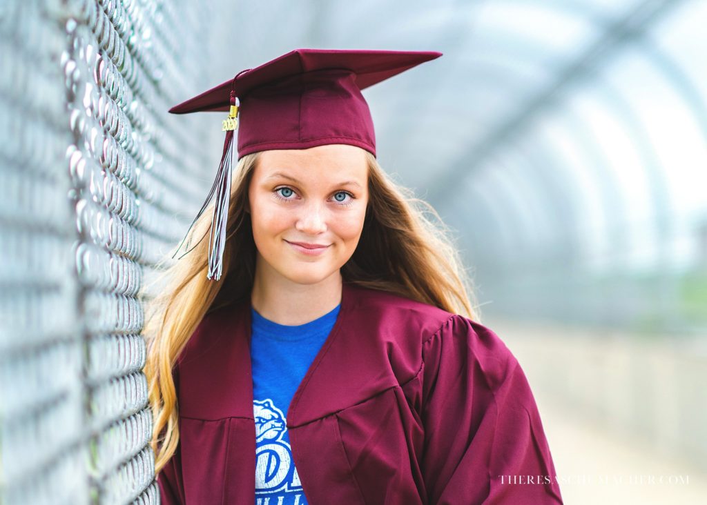 High School Senior Girl in Cap and Gown College T-shirt at photoshoot